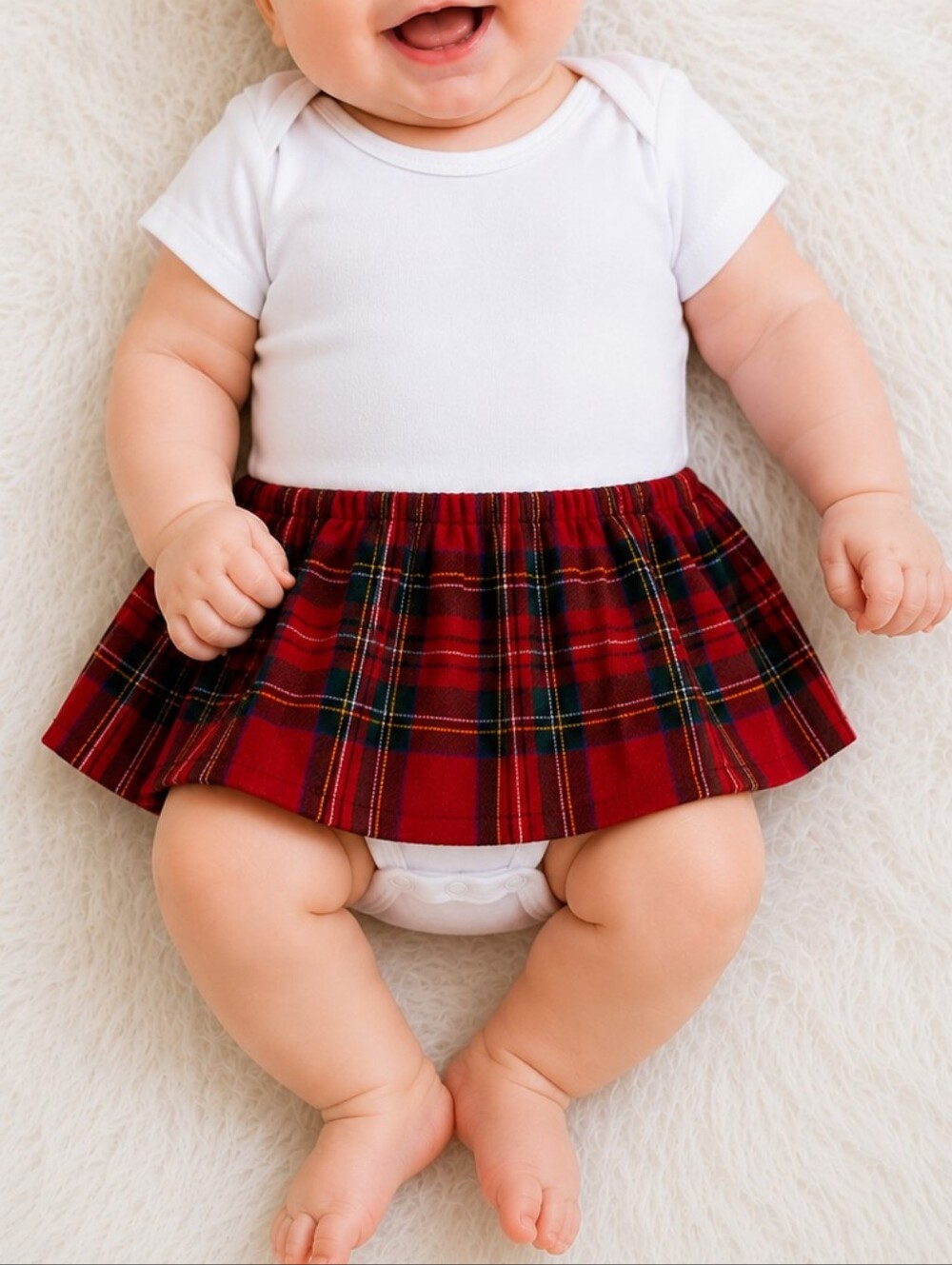 Size 0-3 Artan tots baby girls plaid tartan onesie like new
